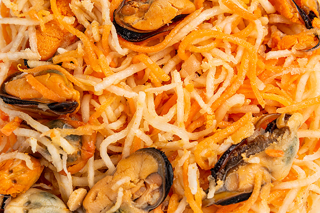 Photo Mussel salad marinated with celery and carrots