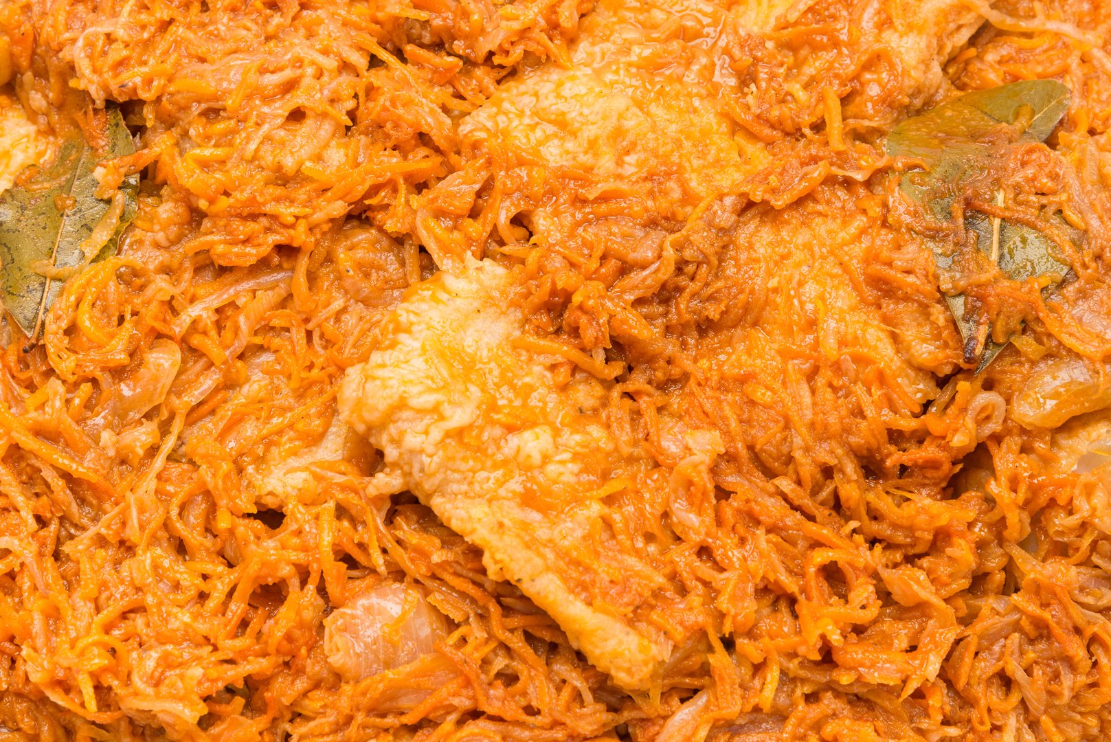 Photo Fish with vegetables in tomato sauce